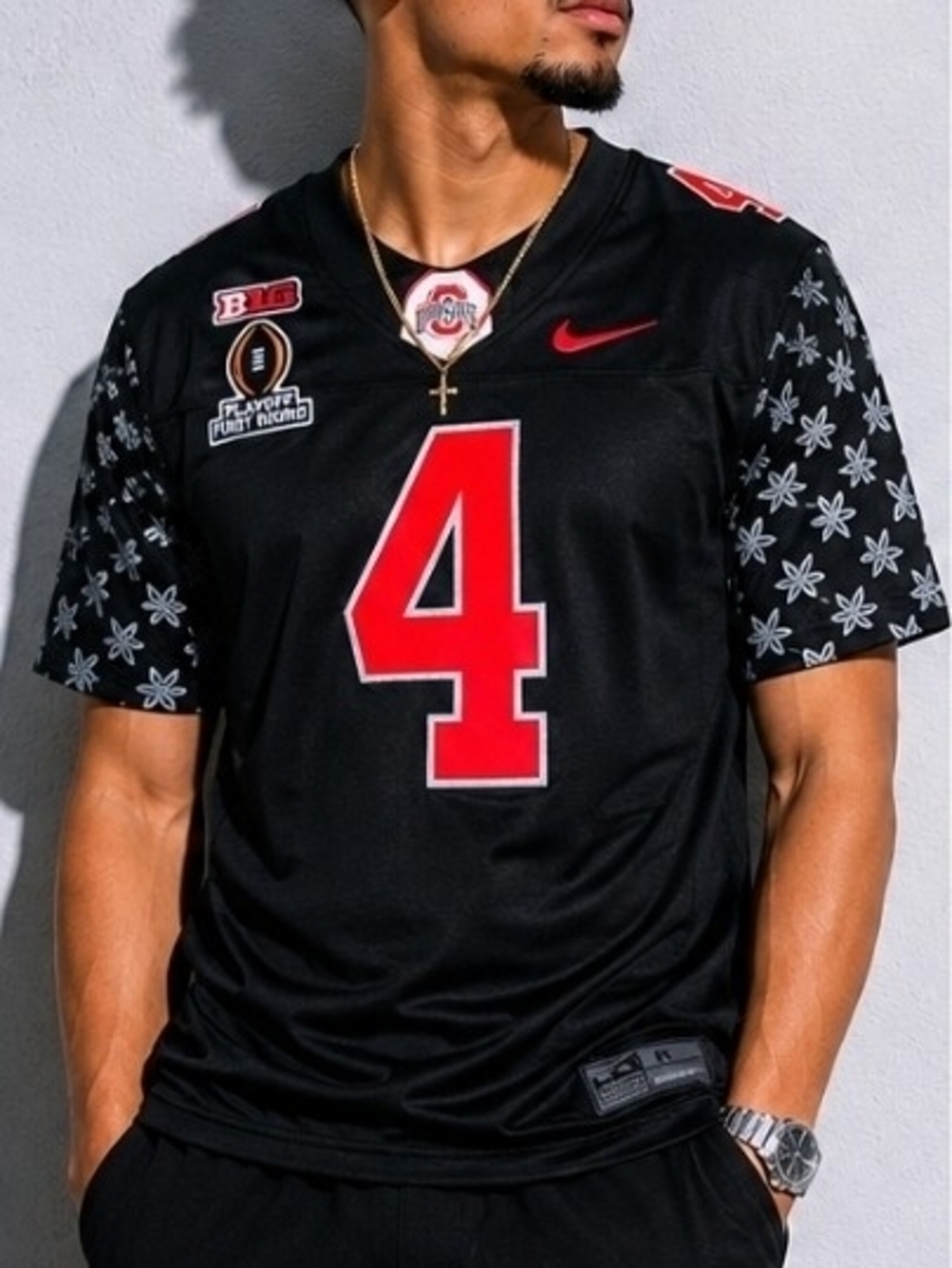 Nike Jeremiah Smith #4 Ohio State Buckeyes Blackout football jersey.